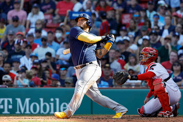 Aug 28, 2022; Boston, Massachusetts, USA; Tampa Bay Rays first baseman Harold Ramirez (43) follows through on an RBI single against the Boston Red Sox during the sixth inning at Fenway Park.